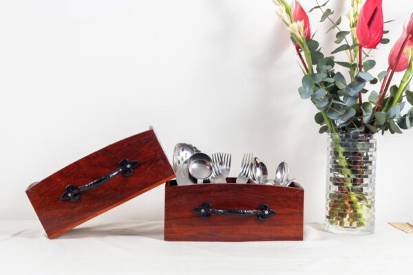 60 year old Padauk wood cutlery holders with cast iron handles.