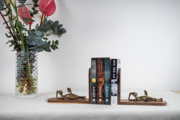 Burma teak bookends with Dogra art from Orissa.